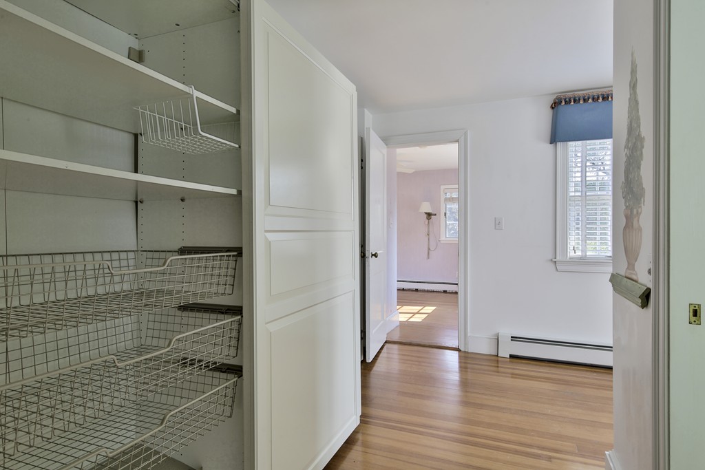 50 Dalton Road Chelmsford, MA 01824 - Photo 22 of 27 a view of a hallway with wooden floor