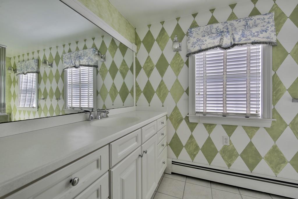 50 Dalton Road Chelmsford, MA 01824 - Photo 23 of 27 a bathroom with a sink and a mirror