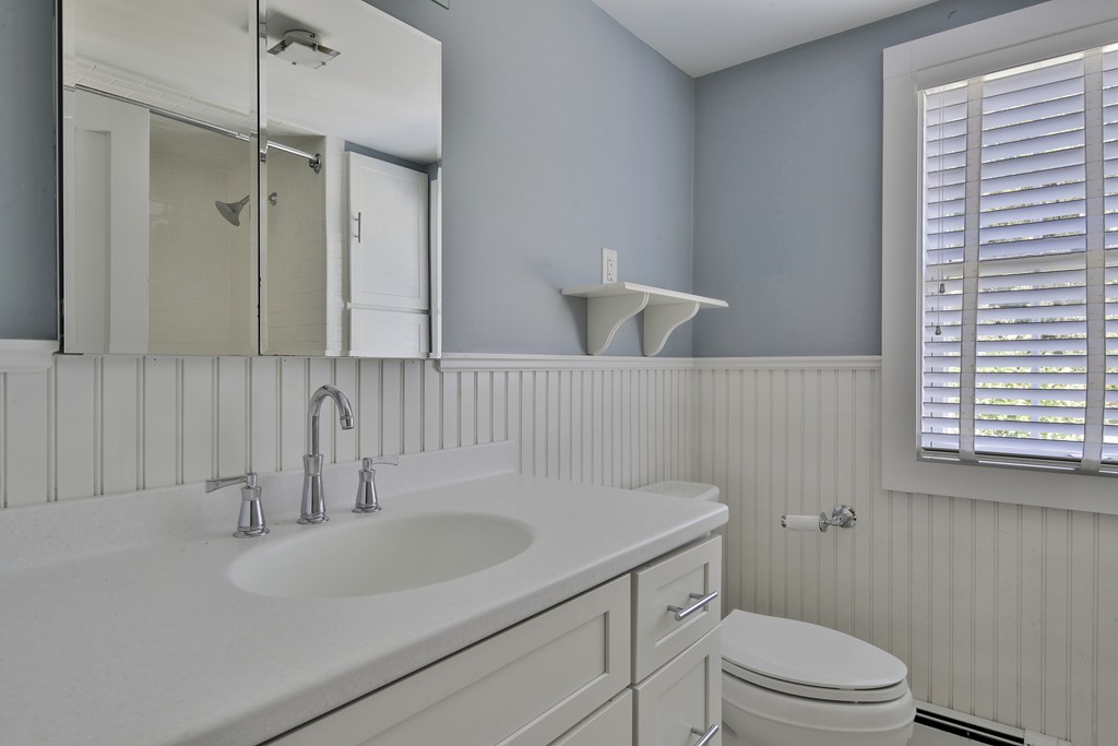 50 Dalton Road Chelmsford, MA 01824 - Photo 24 of 27 a bathroom with a sink toilet a mirror and shower