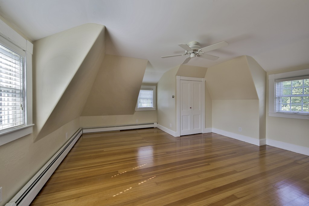 50 Dalton Road Chelmsford, MA 01824 - Photo 27 of 27 an empty room with wooden floor and windows