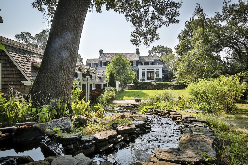 50 Dalton Road Chelmsford, MA 01824 - Photo 7 of 27 a view of a garden with a fountain