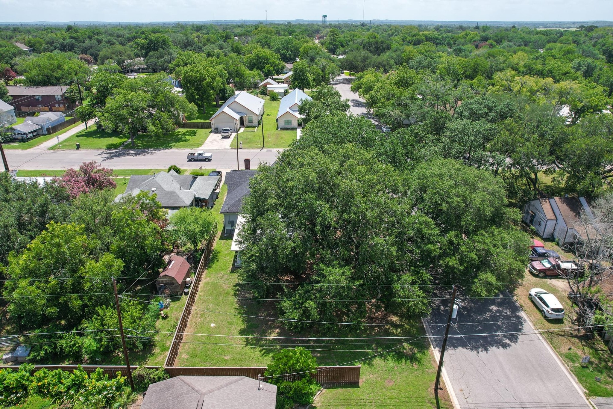 522 South Walnut Avenue Luling, TX 78648 - Photo 32 of 33 an aerial view of a house with a yard basket ball court and outdoor seating