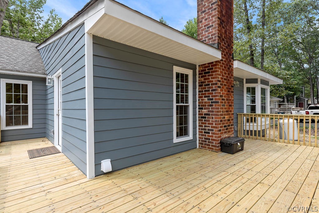 5019 Rollingway Road Chesterfield, VA 23832 - Photo 22 of 24 a view of a house with a backyard