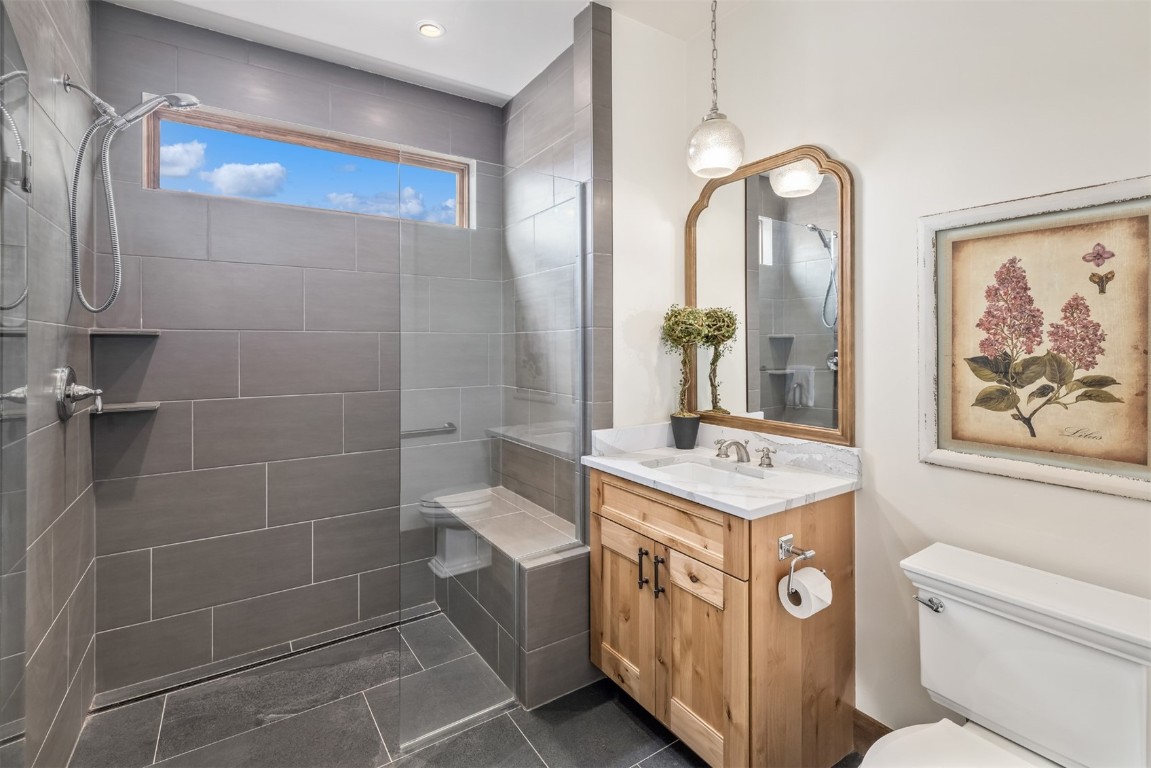 391 Angler Mountain Ranch Road Silverthorne, CO 80498 - Photo 27 of 50 a bathroom with a sink a vanity and a mirror