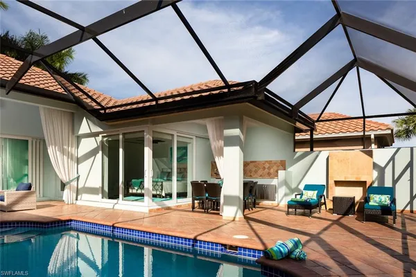 a view of outdoor space with swimming pool and patio