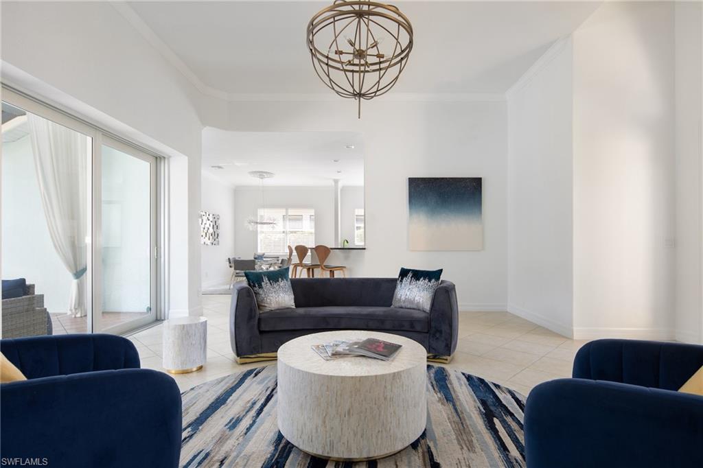 982 Tivoli Court Naples, FL 34104 - Photo 15 of 40 a living room with furniture and a window