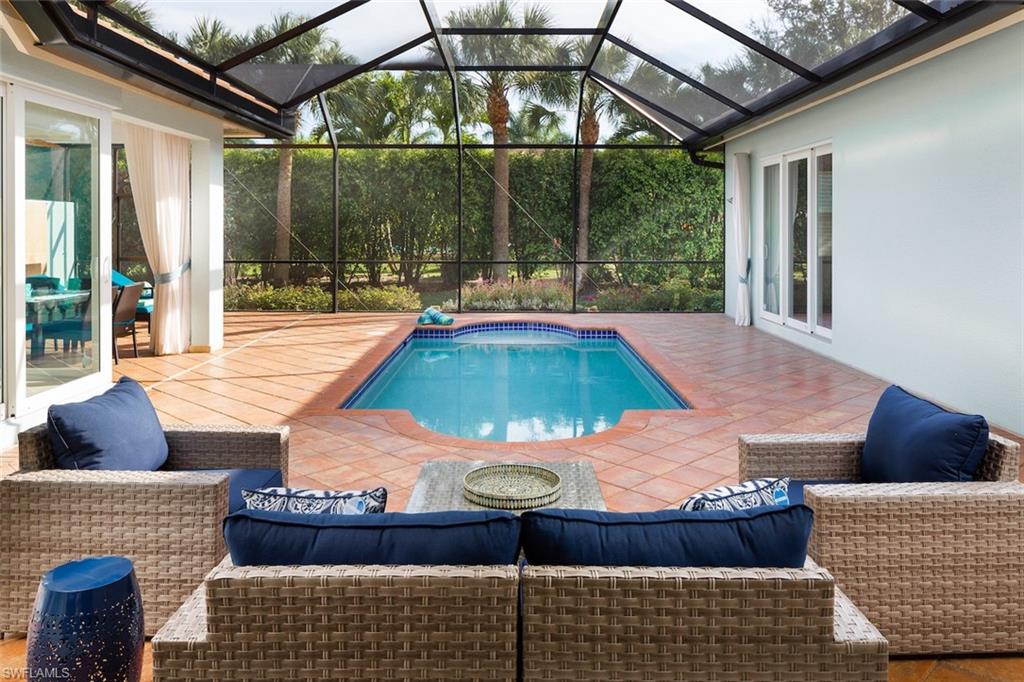 982 Tivoli Court Naples, FL 34104 - Photo 7 of 40 a room with furniture and window