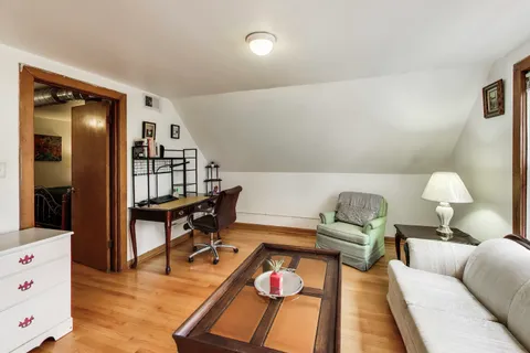 a living room with furniture and a table