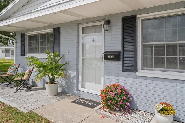 a living room with furniture and view of living room