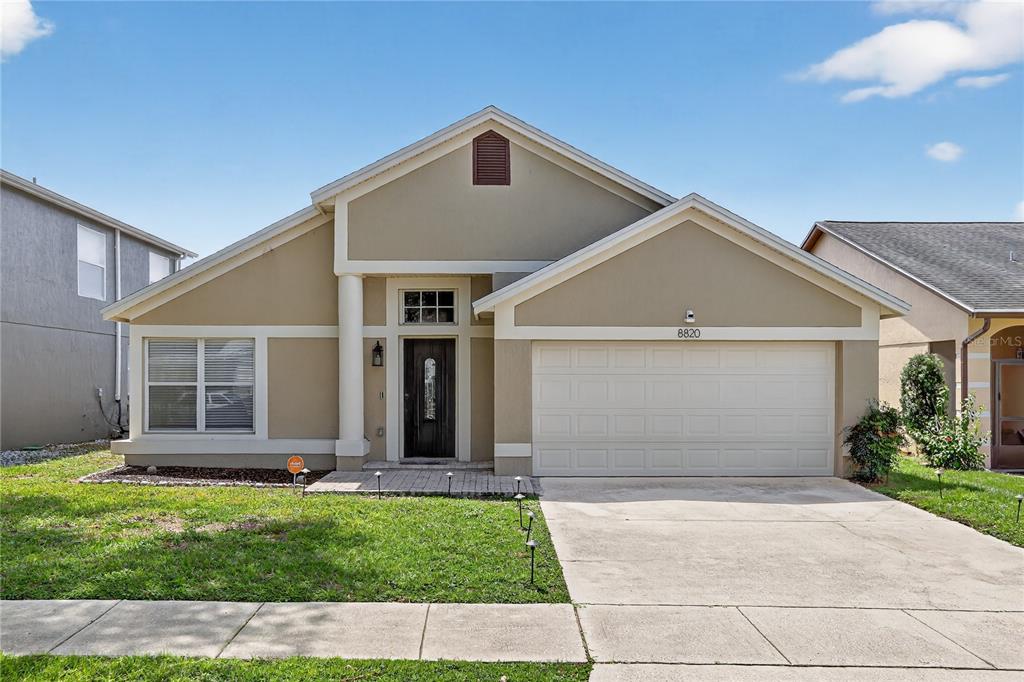 a front view of house with yard