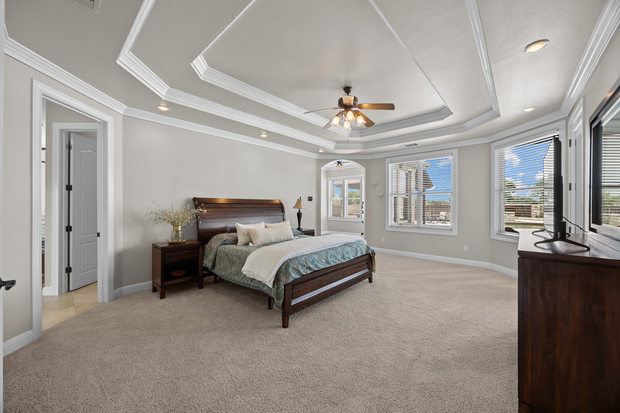 341 Courtnee's Way Georgetown, TX 78626 - Photo 17 of 40 The primary bedroom features a separate sitting area with a fireplace and an incredible ensuite bathroom.