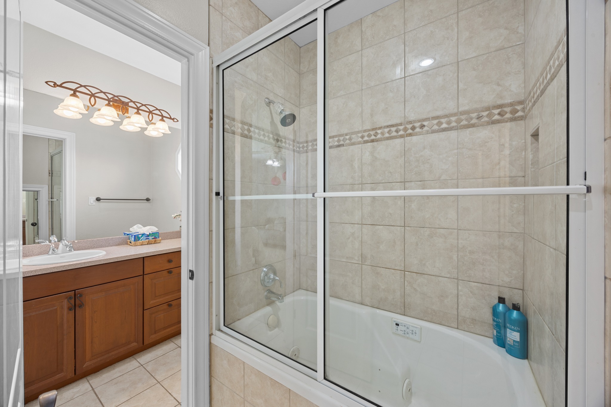 341 Courtnee's Way Georgetown, TX 78626 - Photo 26 of 40 The secondary bedrooms on the left side of the upstairs space share a Jack and Jill bathroom.