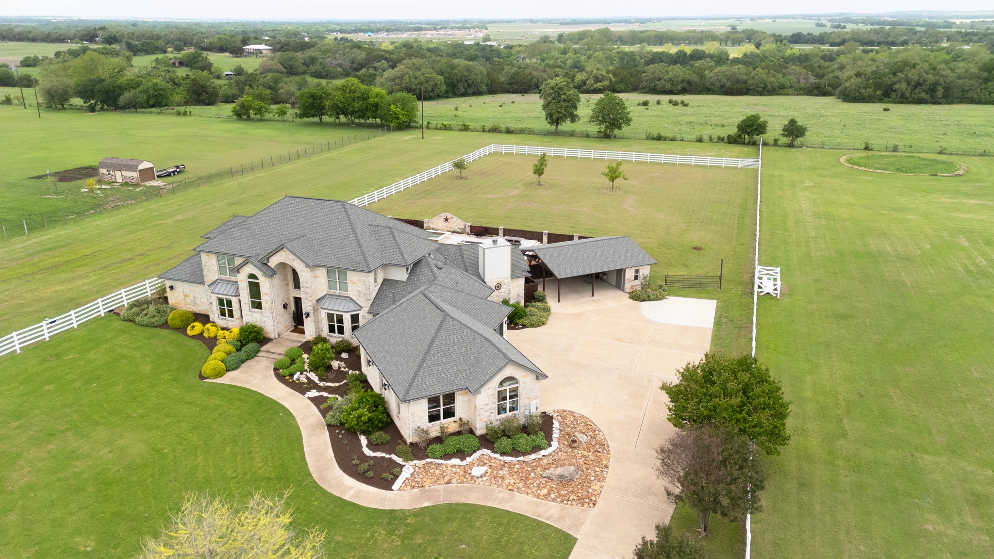 341 Courtnee's Way Georgetown, TX 78626 - Photo 3 of 40 The property has incredible mature landscaping surrounding the home and is fully fenced.