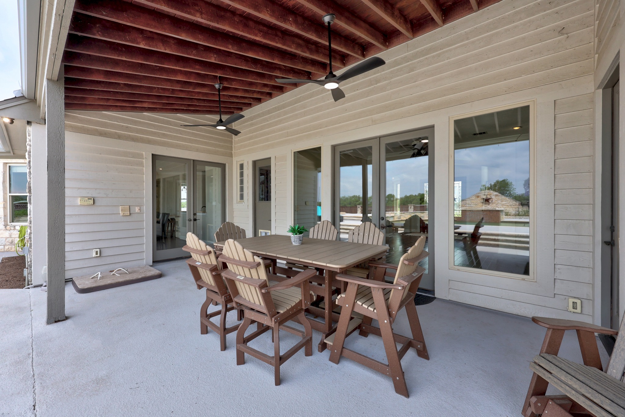 341 Courtnee's Way Georgetown, TX 78626 - Photo 34 of 40 Two ceiling fans will keep you cool as you dine al fresco.