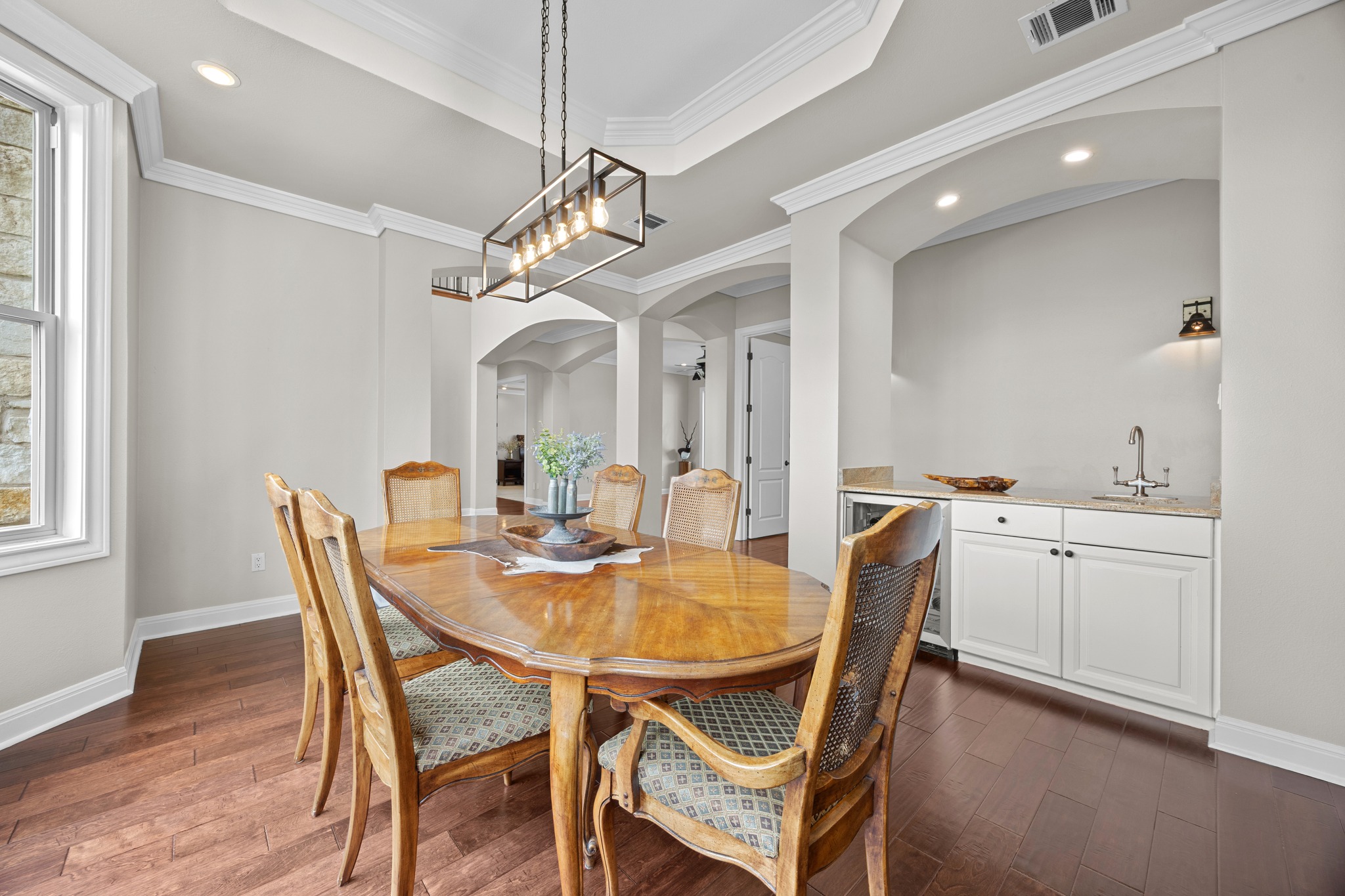 341 Courtnee's Way Georgetown, TX 78626 - Photo 6 of 40 The inclusion of a built-in butler’s pantry with a wine fridge and wet bar makes this the ultimate spot for hosting holiday dinners.