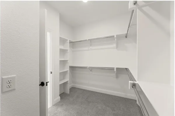 a storage room with cabinets