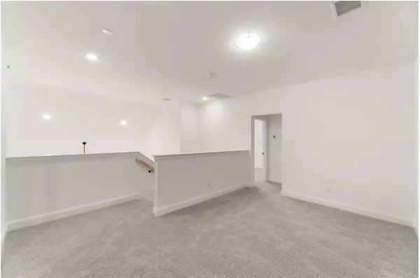 an empty room with an entryway
