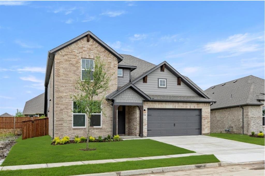 2902 Hanscom Street Forney, TX 75126 - Photo 2 of 28 View of front of property featuring brick siding, a garage, and concrete driveway