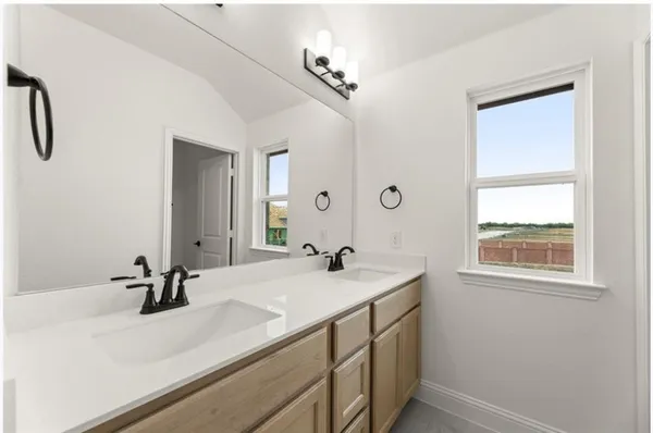 a bathroom with a sink a toilet and a bathtub
