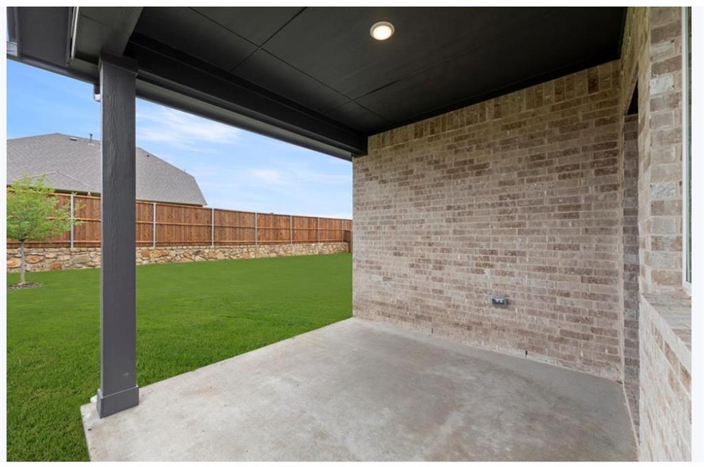 2902 Hanscom Street Forney, TX 75126 - Photo 26 of 28 Fenced backyard featuring a patio area