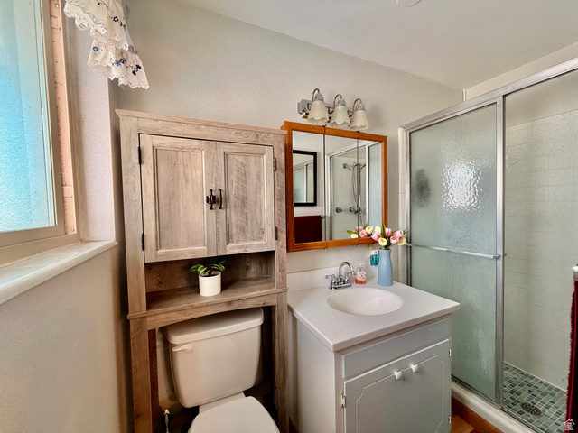 2298 West 800 North Clinton, UT 84015 - Photo 15 of 53 Full bath with vanity and a stall shower off of owner's bedroom