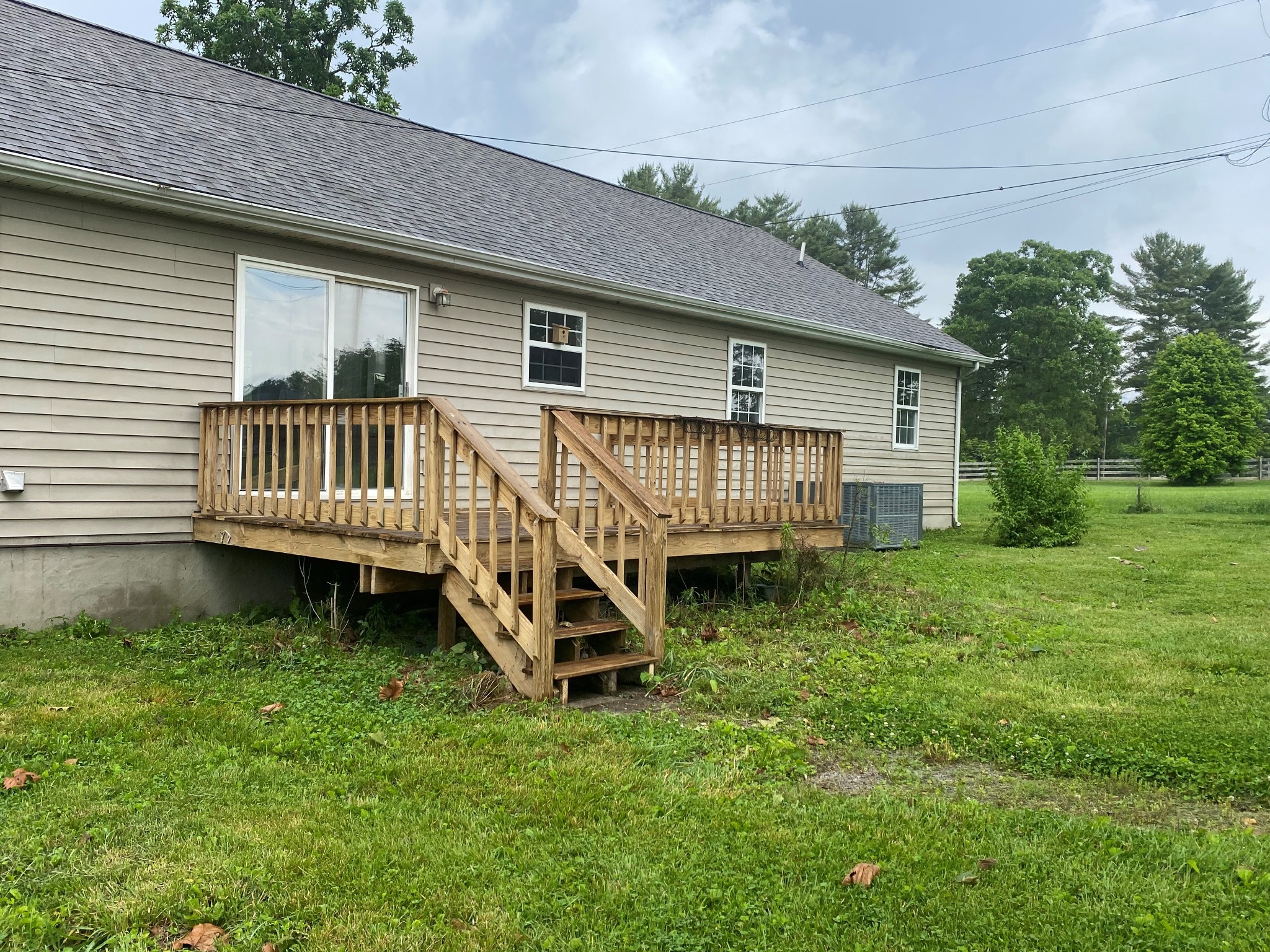 1010 Deep Draw Road Crossville, TN 38555 - Photo 5 of 33 a view of a house with a yard and deck