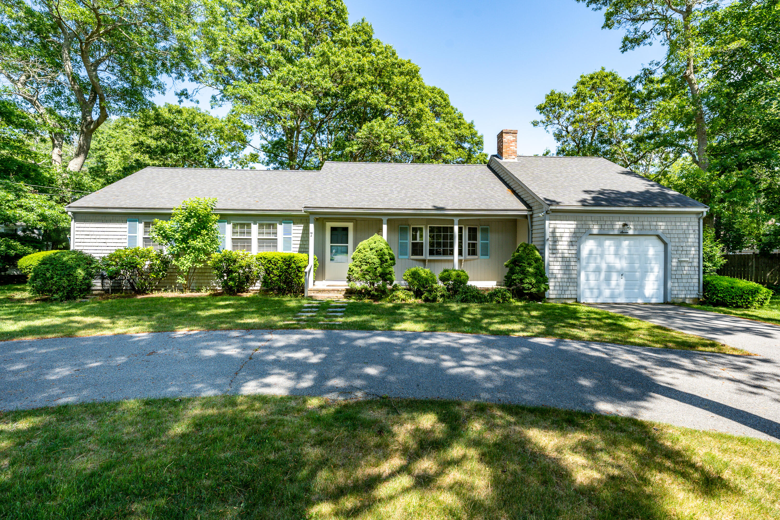 7 Rolling Hitch Road Centerville, MA 02632 - Photo 1 of 19 a house view with a garden space