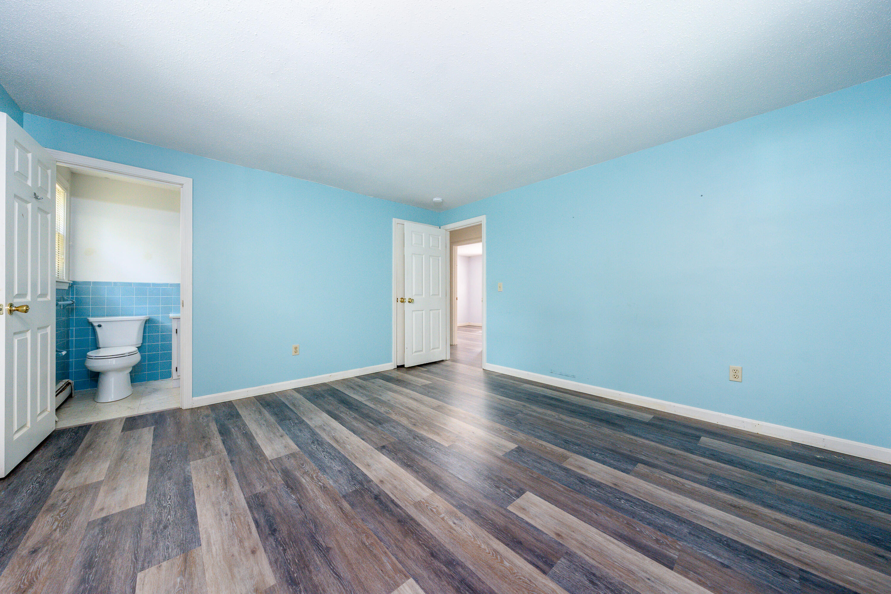 7 Rolling Hitch Road Centerville, MA 02632 - Photo 15 of 19 a view of an empty room and a gallery