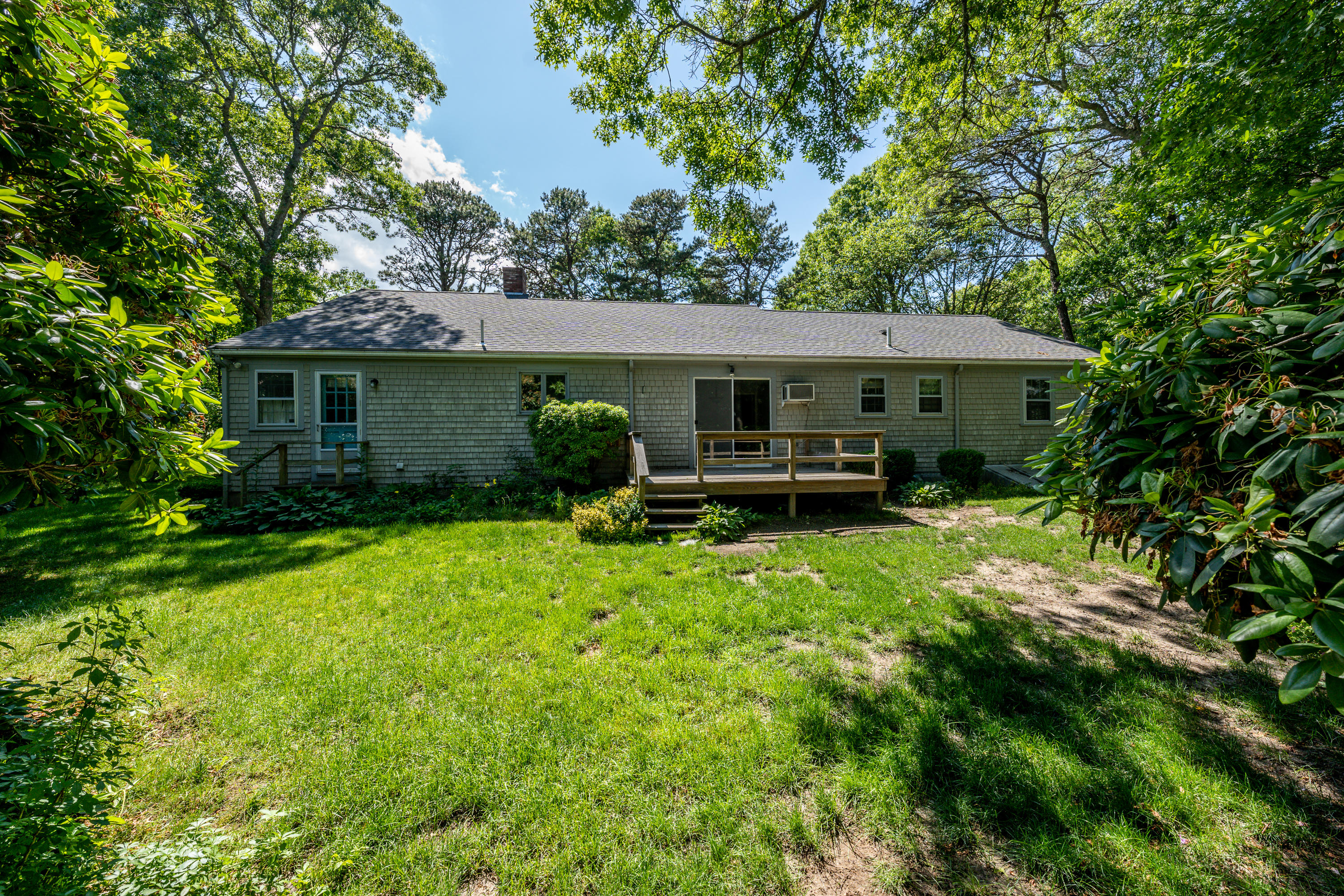 7 Rolling Hitch Road Centerville, MA 02632 - Photo 3 of 19 a front view of house with yard and green space