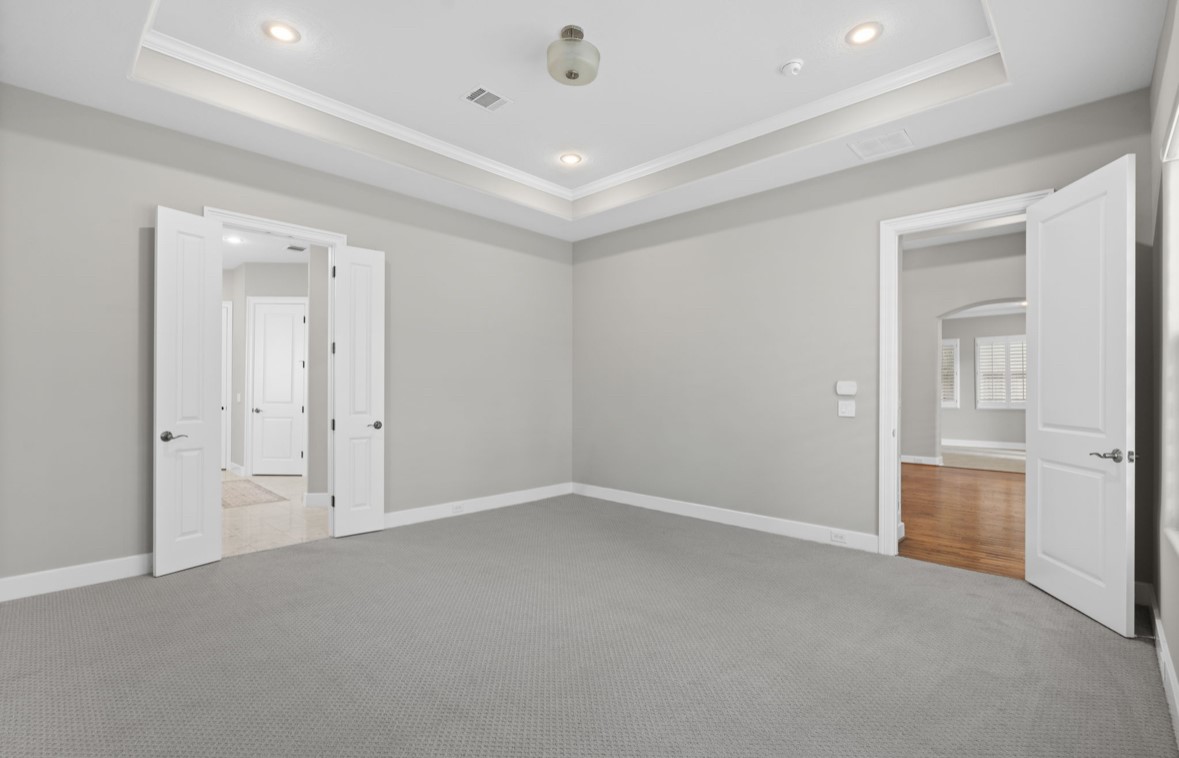 11206 Castille Lane Houston, TX 77082 - Photo 21 of 45 an empty room with fan and entrance