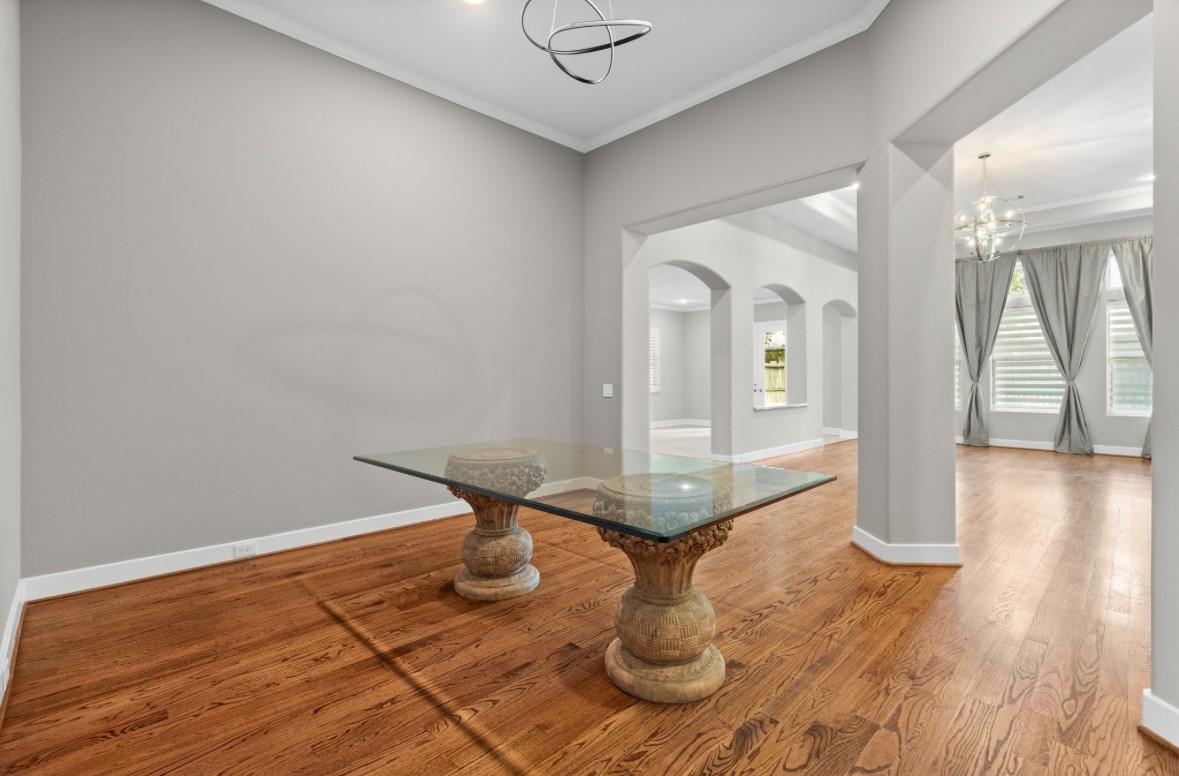 11206 Castille Lane Houston, TX 77082 - Photo 9 of 45 a view of a room with wooden floor and glass door