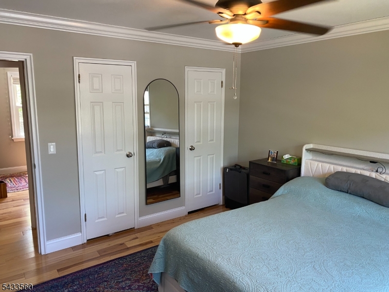 390 Morris Avenue, Unit 4 Summit, NJ 07901 - Photo 8 of 11 a bedroom with bed and window