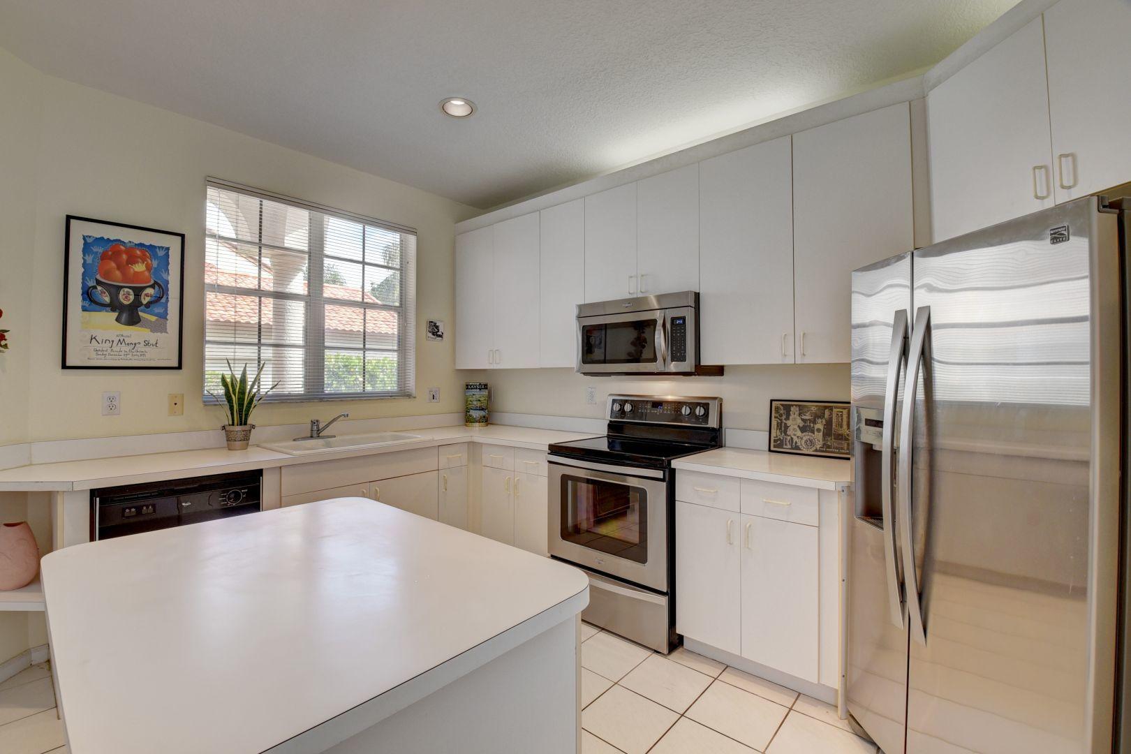 23349 Water Circle Boca Raton, FL 33486 - Photo 12 of 44 Window over the kitchen sink