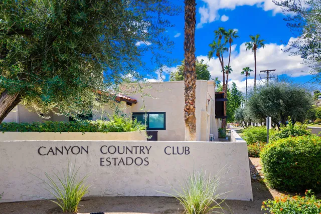 a view of a sign in front of a house