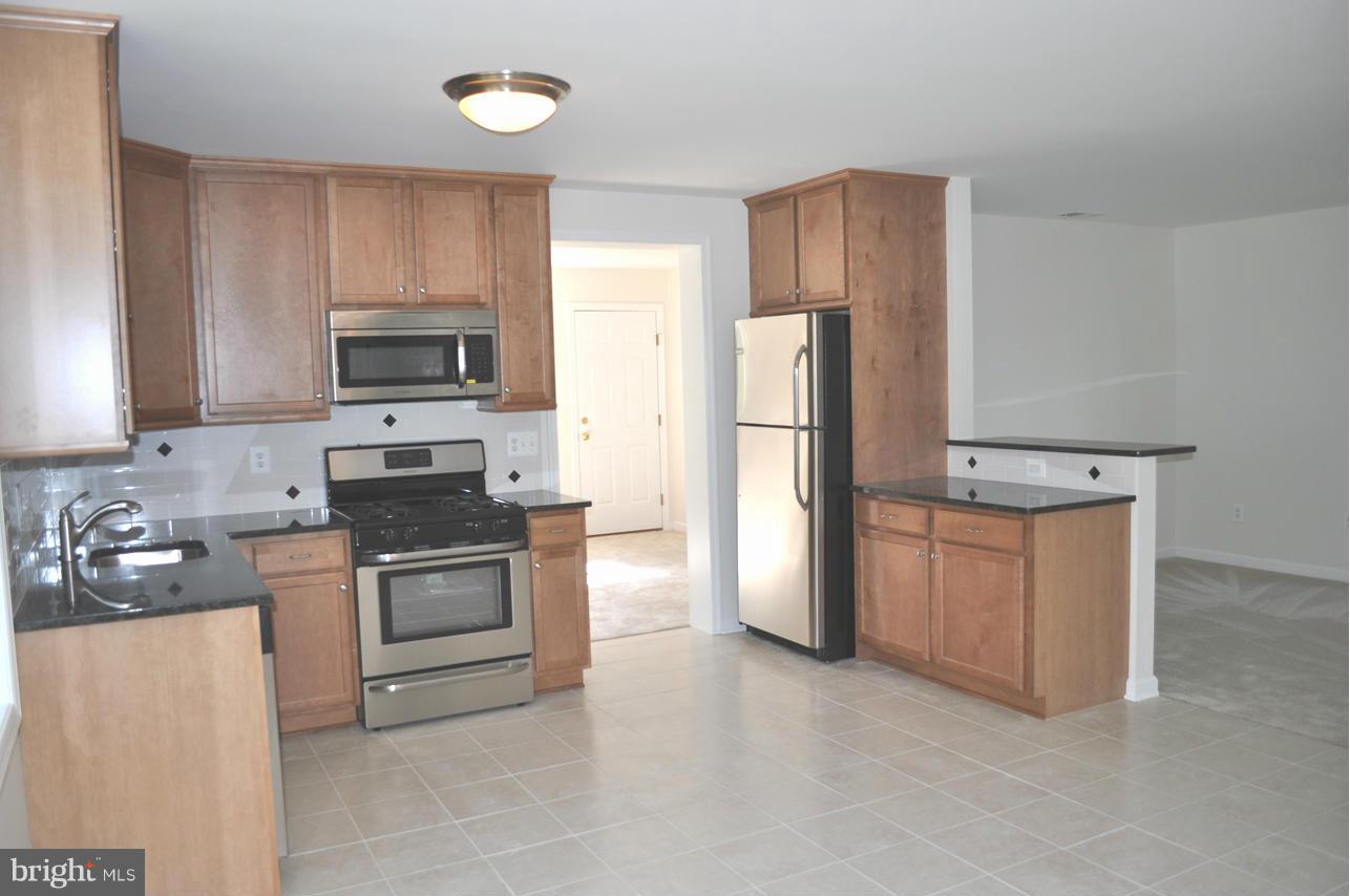 5309 Moultrie Road Springfield, VA 22151 - Photo 2 of 11 Open plan with updated kitchen