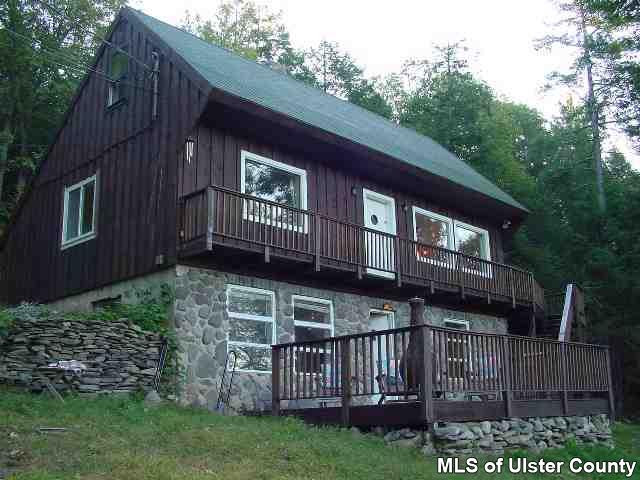 26 Carle Road Mount Tremper, NY 12457 - Photo 1 of 5 a view of backyard with deck and garden