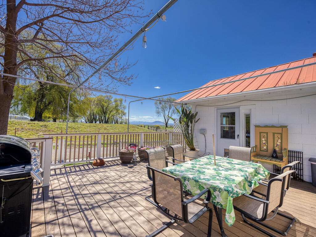 4650 Lower Klamath Lake Road Klamath Falls, OR 97603 - Photo 24 of 37 a view of a patio with a table and chairs