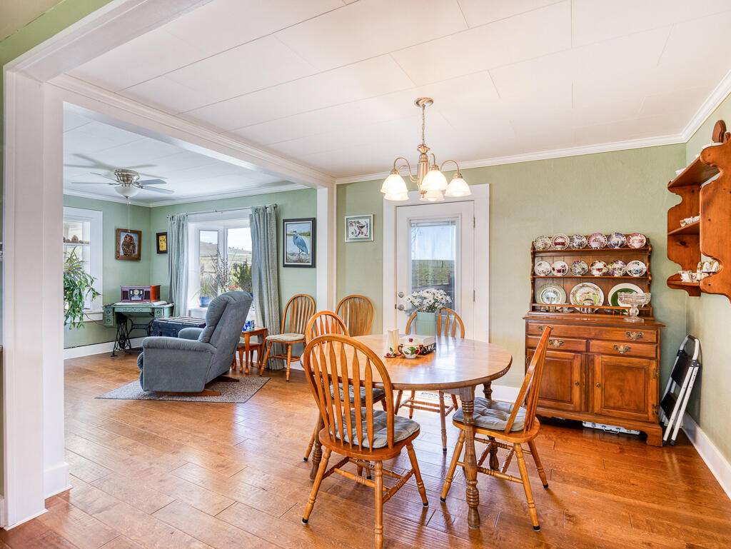 4650 Lower Klamath Lake Road Klamath Falls, OR 97603 - Photo 10 of 37 a view of a dining room with furniture and a chandelier