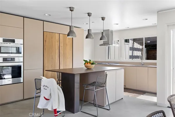 a room with table and chairs