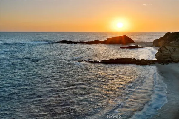 a view of a lake with a yard