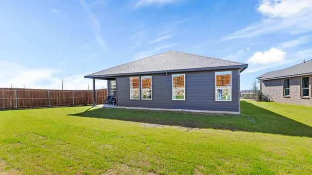 a view of a lake and a yard