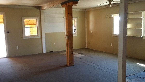 29 Dwight Cross Road Colrain, MA 01340 - Photo 6 of 10 an empty room with windows