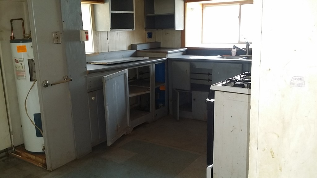 29 Dwight Cross Road Colrain, MA 01340 - Photo 9 of 10 a kitchen with a sink and a refrigerator
