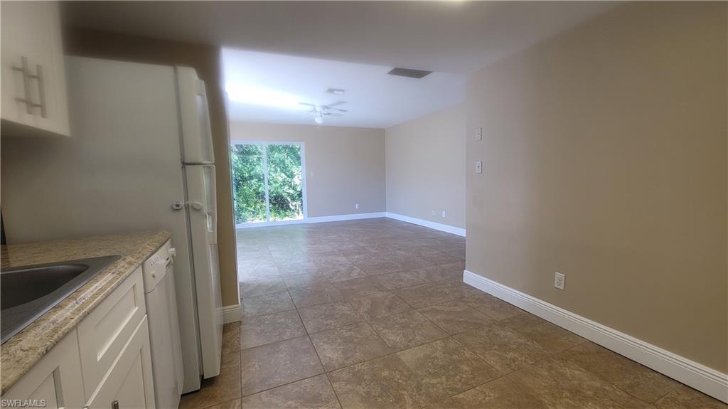 7504-7508 Pebble Beach Road Fort Myers, FL 33967 - Photo 12 of 13 a view of hallway with washer and dryer
