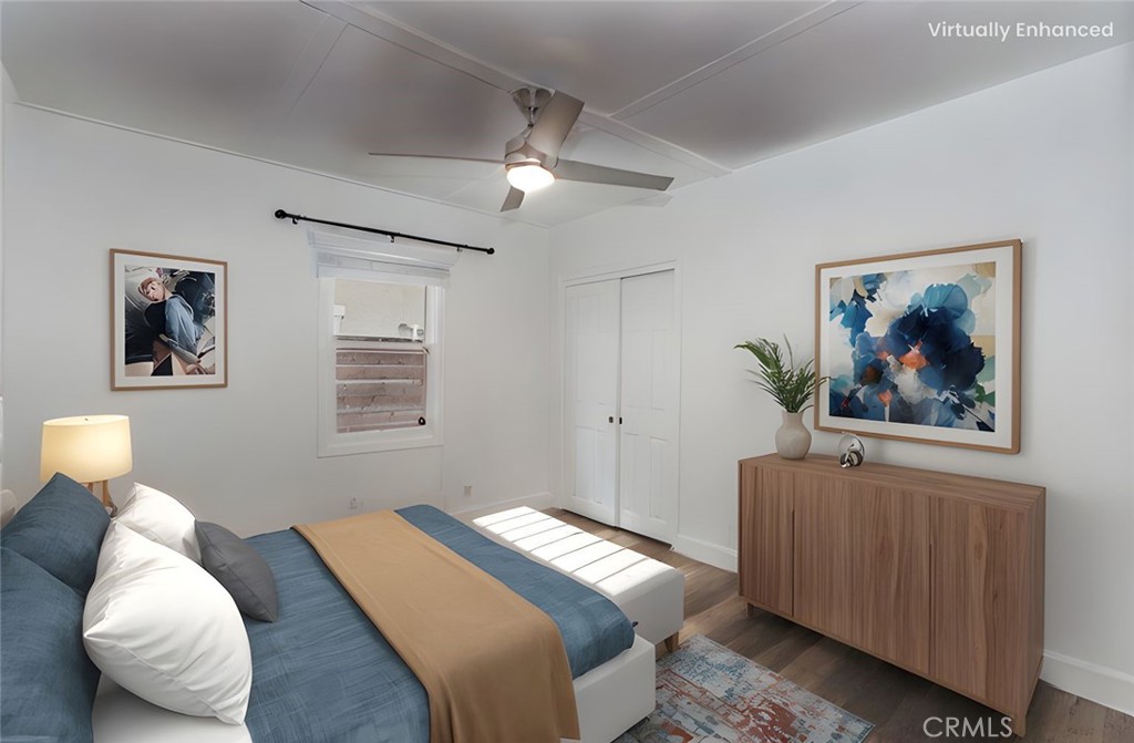 415 7th Street Paso Robles, CA 93446 - Photo 12 of 21 a bedroom with bed and furniture