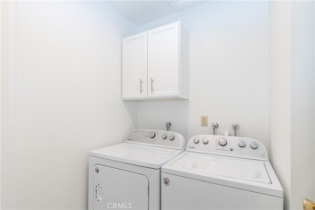 415 7th Street Paso Robles, CA 93446 - Photo 17 of 21 a utility room with dryer and washer