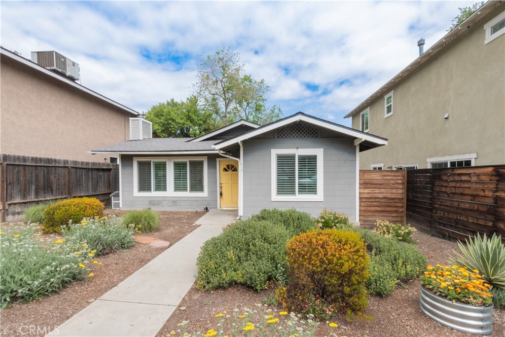 415 7th Street Paso Robles, CA 93446 - Photo 2 of 21 a front view of house with a garden