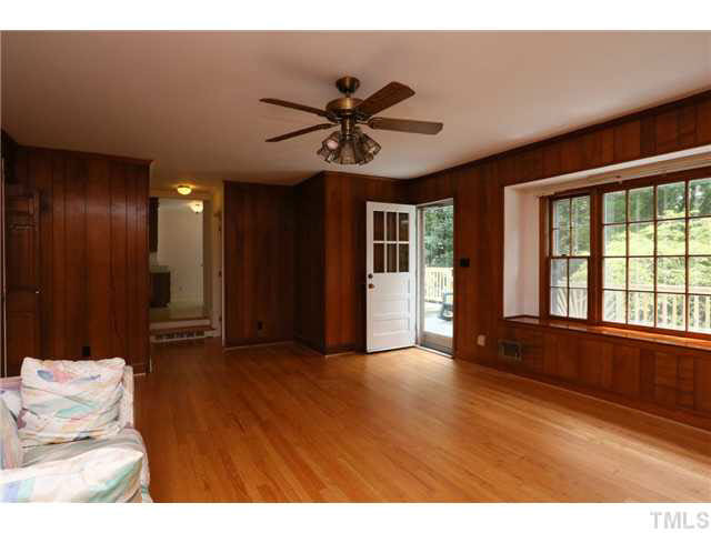 1217 Shelley Road Raleigh, NC 27609 - Photo 9 of 24 Family room with access to deck!