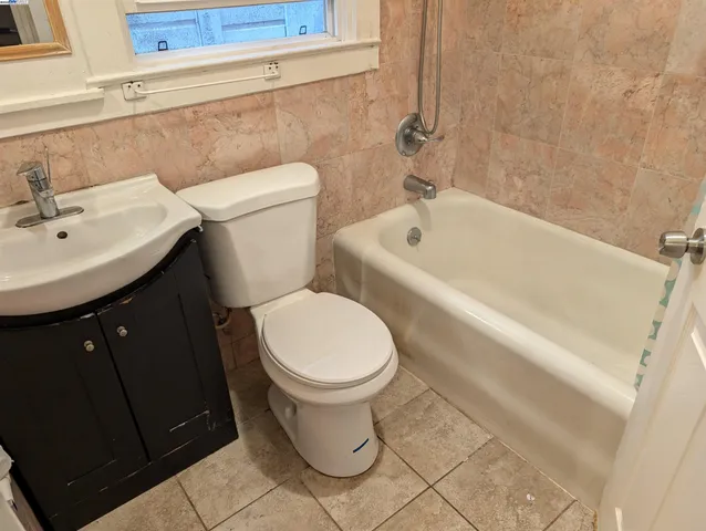 a bathroom with a sink and toilet