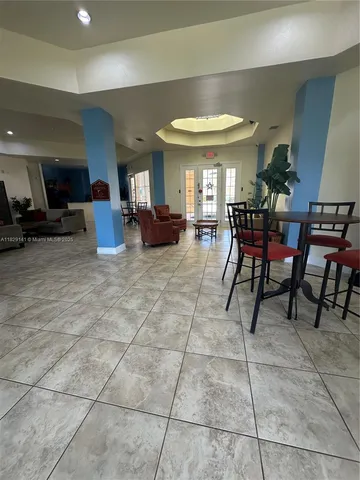a view of a dining room with furniture